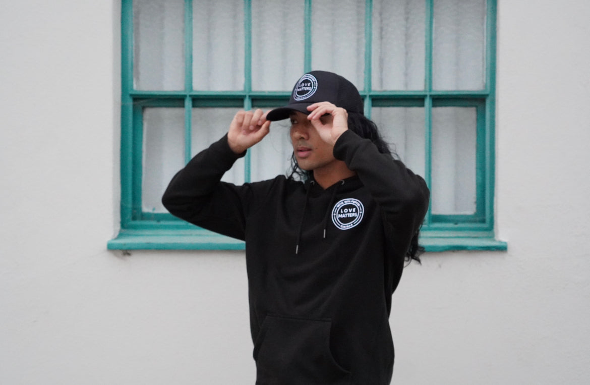 Lacañgan Collection Love Matters Trucker Hat - Black